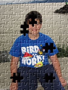 photo of Little Man with puzzle pieces out